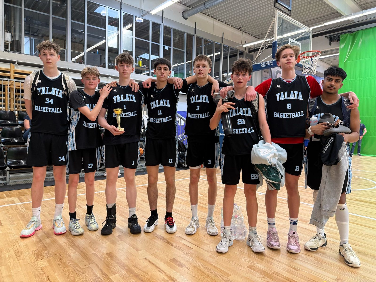 Talata Academy squad in black game jerseys