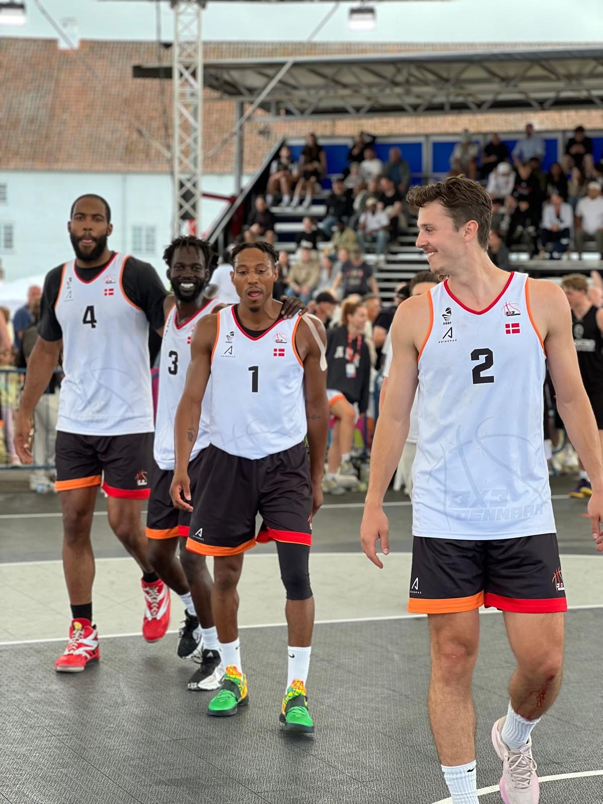 Talata Men players on court in white gear