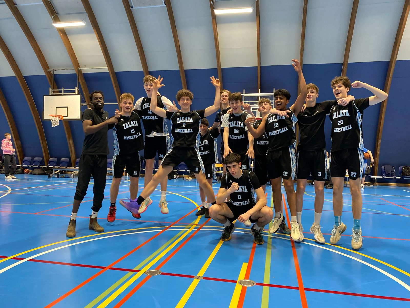 Talata squad celebrating in club gear