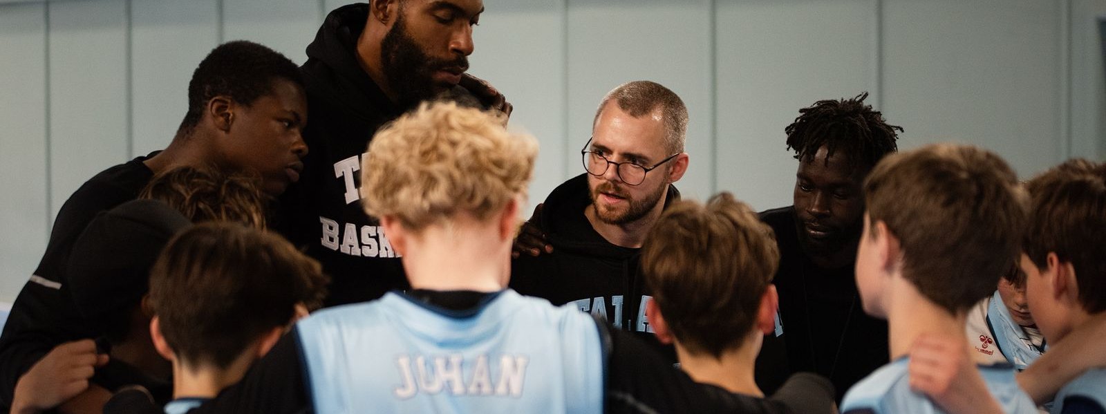Talata Basketball huddle