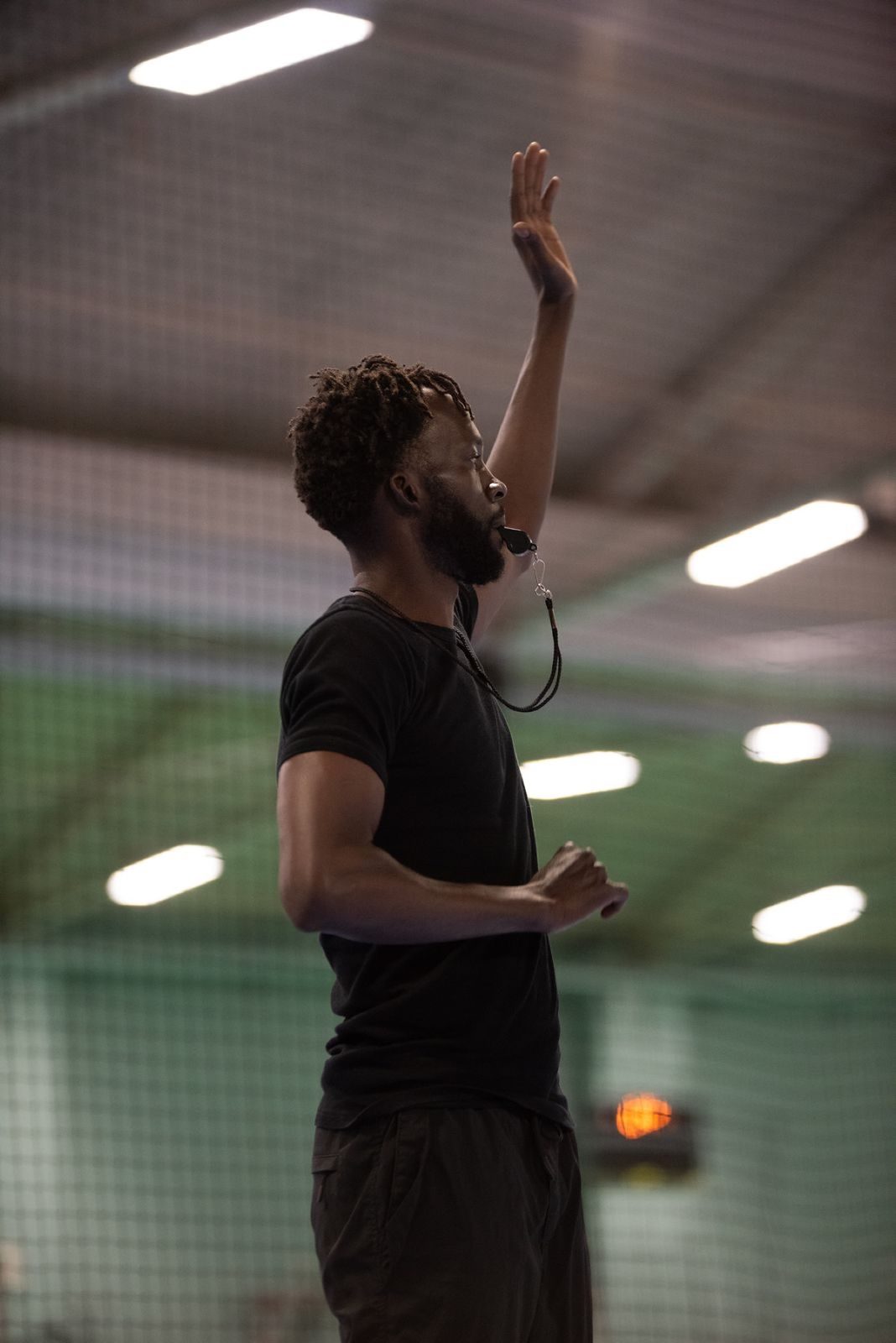 Referee with whistle on game day