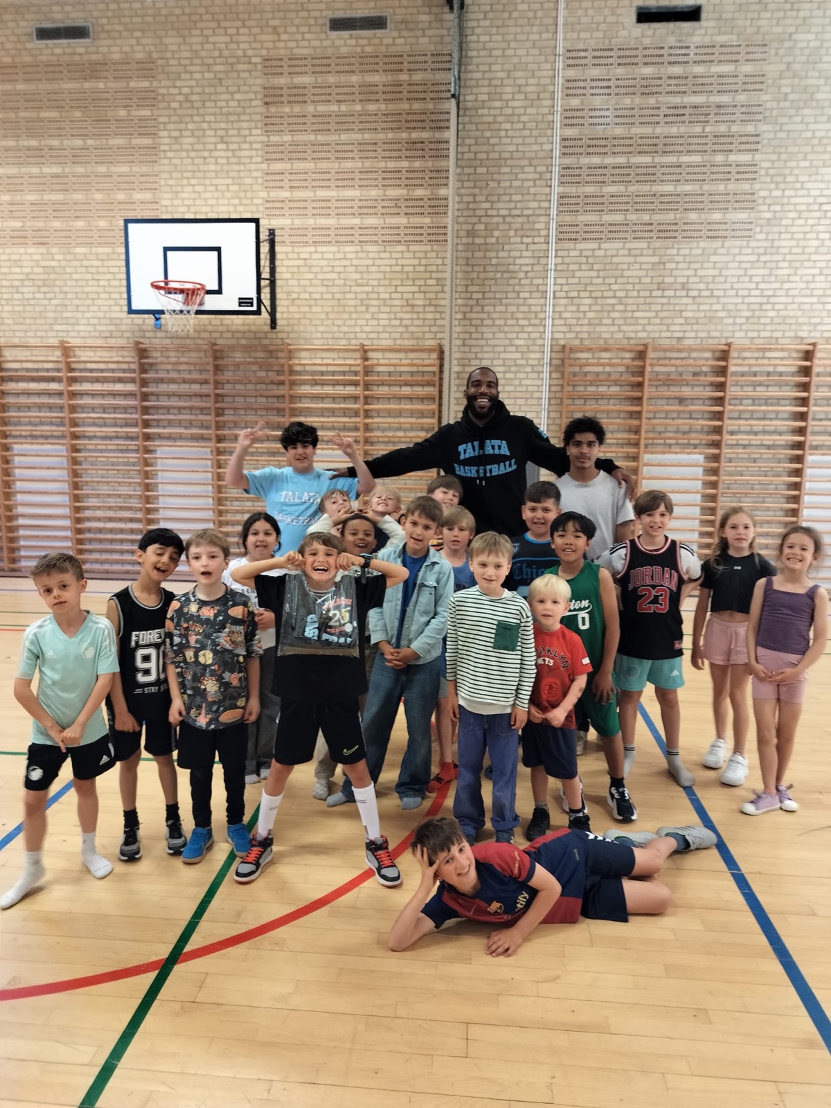 School basketball group with Talata coach