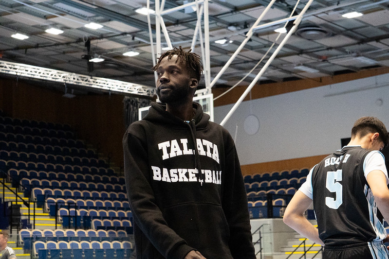 Coach Deng Awak in the Talata Basketball hoodie